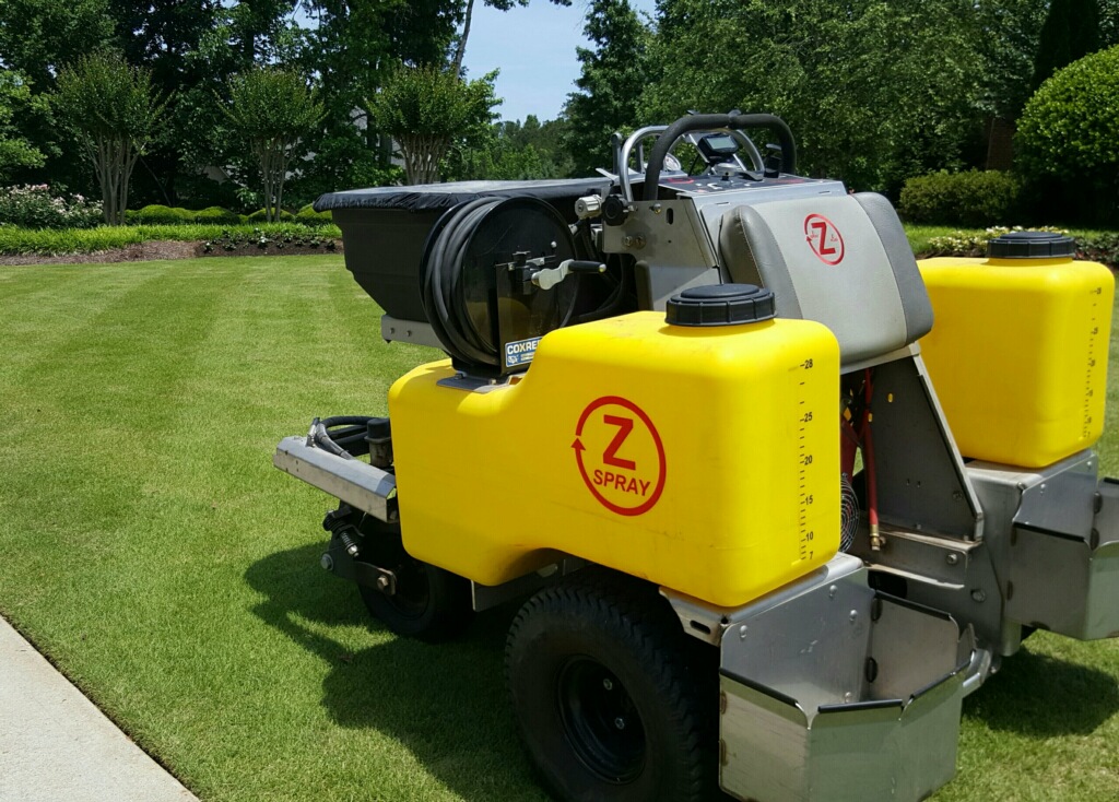 Lawn Weed Control Pre-Emergent at Zoysia Grass Yard in Eagle\'s Landing Country Club.